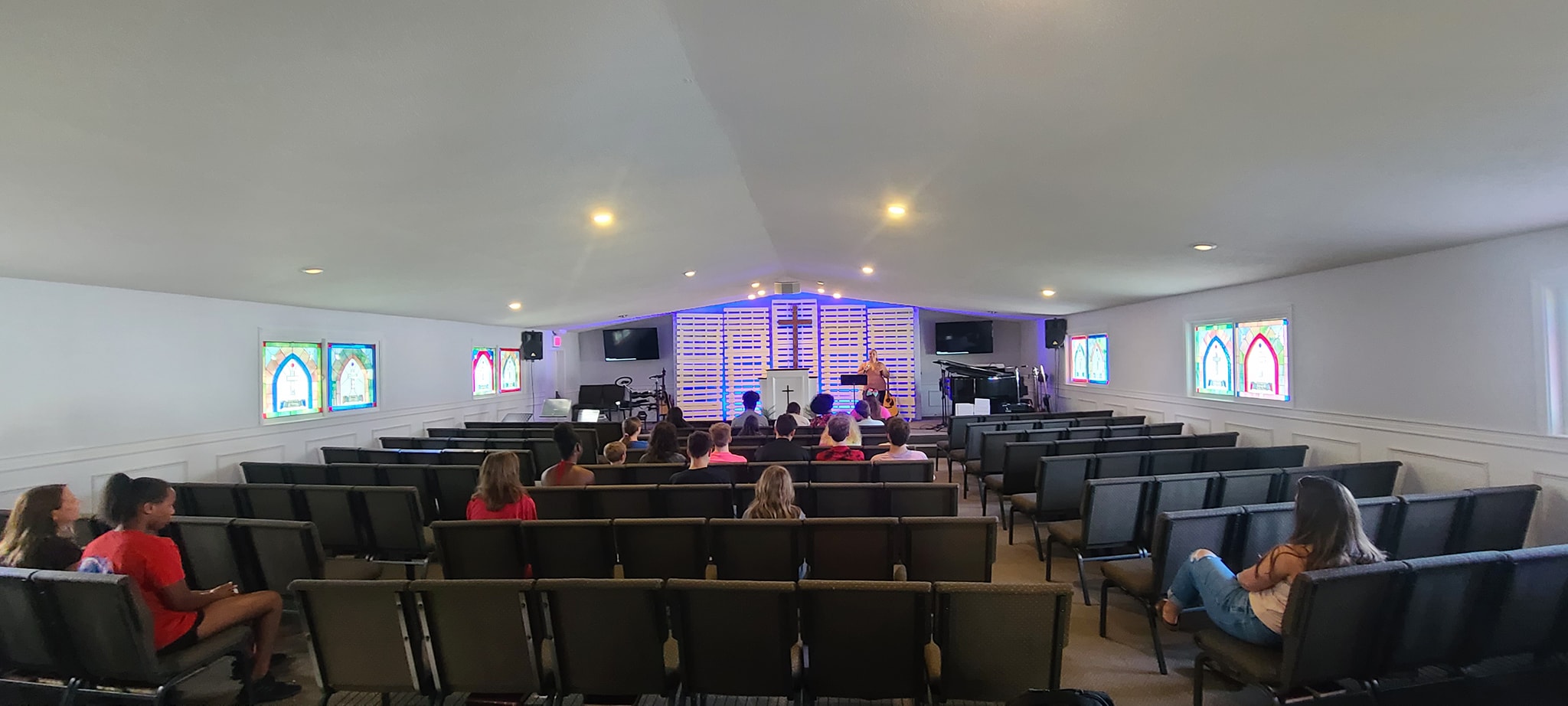 students gathered in a church