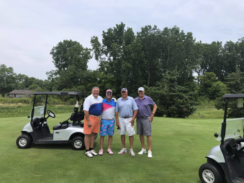 Male golfers at a golf outing