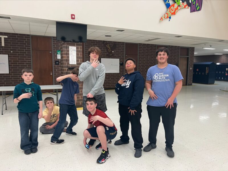 delta middle school boys posing at school